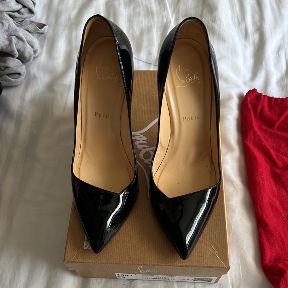 Christian Louboutins Black High Heel Pumps